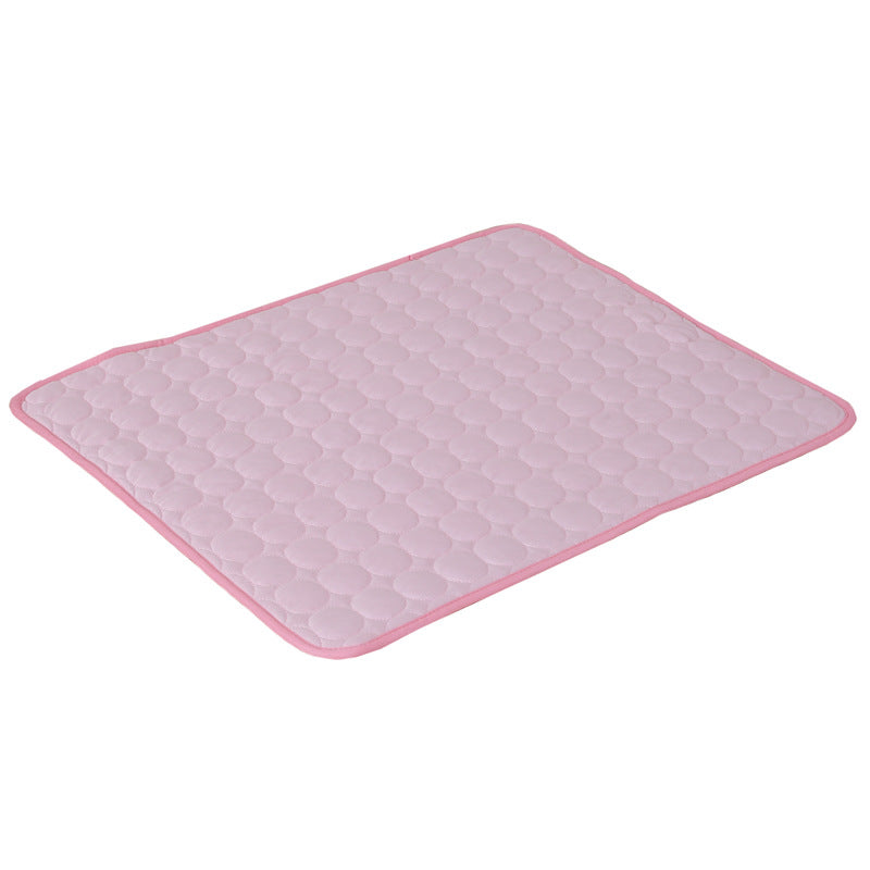 Maroon Asteria pet summer portable ice silk cooling pad on a bed, designed to keep pets cool and comfortable during hot weather.