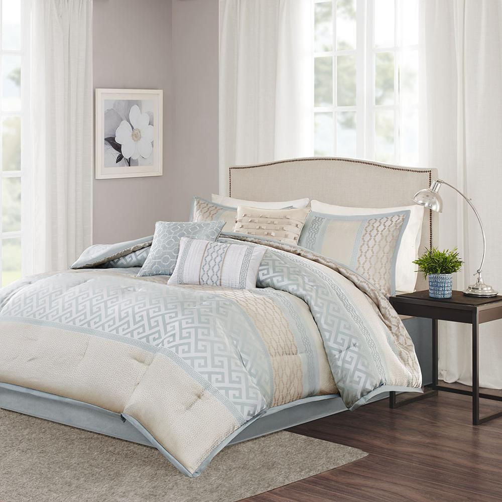 Start2Finish 7-piece comforter set with matching pillow shams and decorative accents in a cozy, stylish bedroom arrangement.