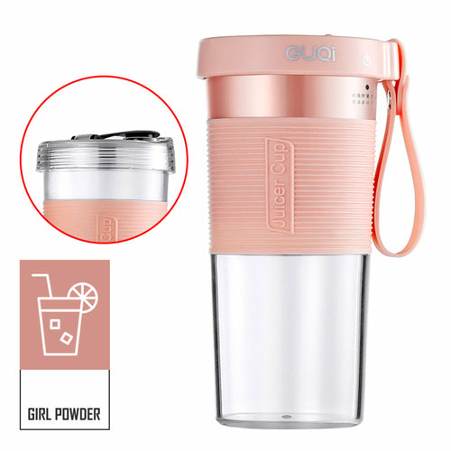 Maroon Asteria mini USB rechargeable portable electric fruit juicer on kitchen countertop with fresh fruits.