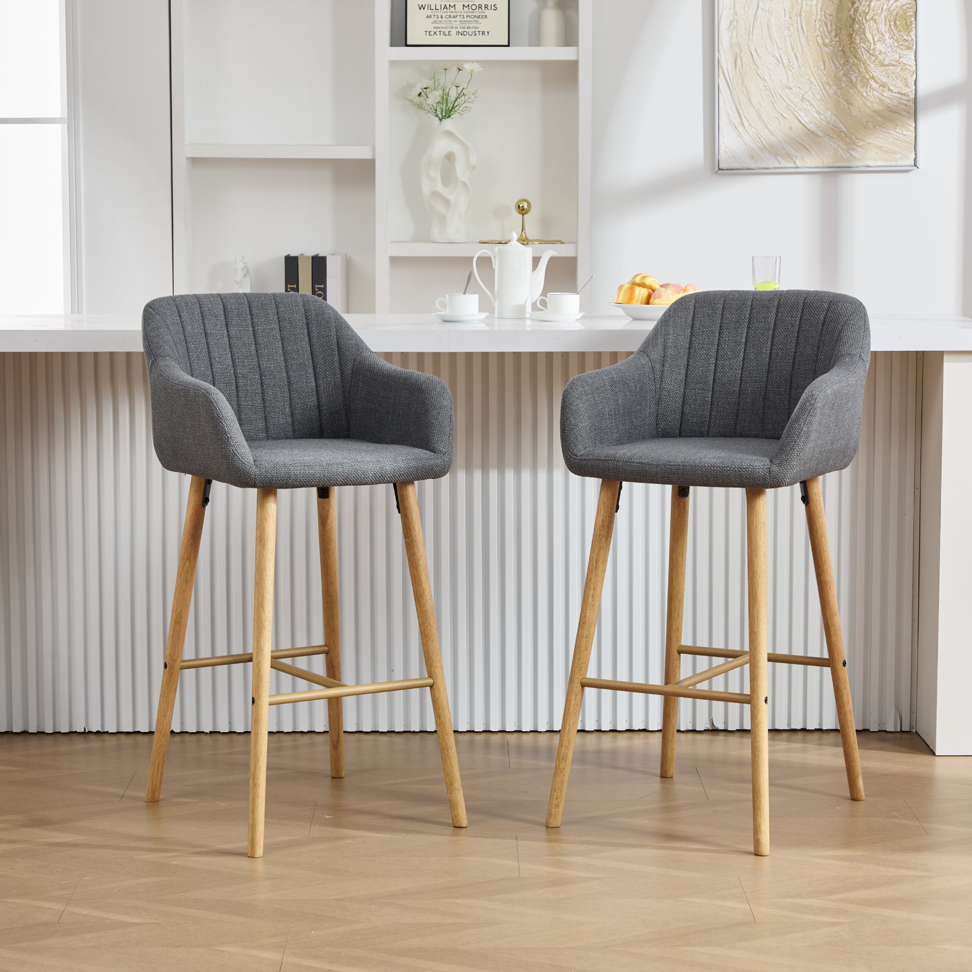 Modern linen upholstered bar stool with back, armrests, footrest, and solid wood legs from Start2Finish.