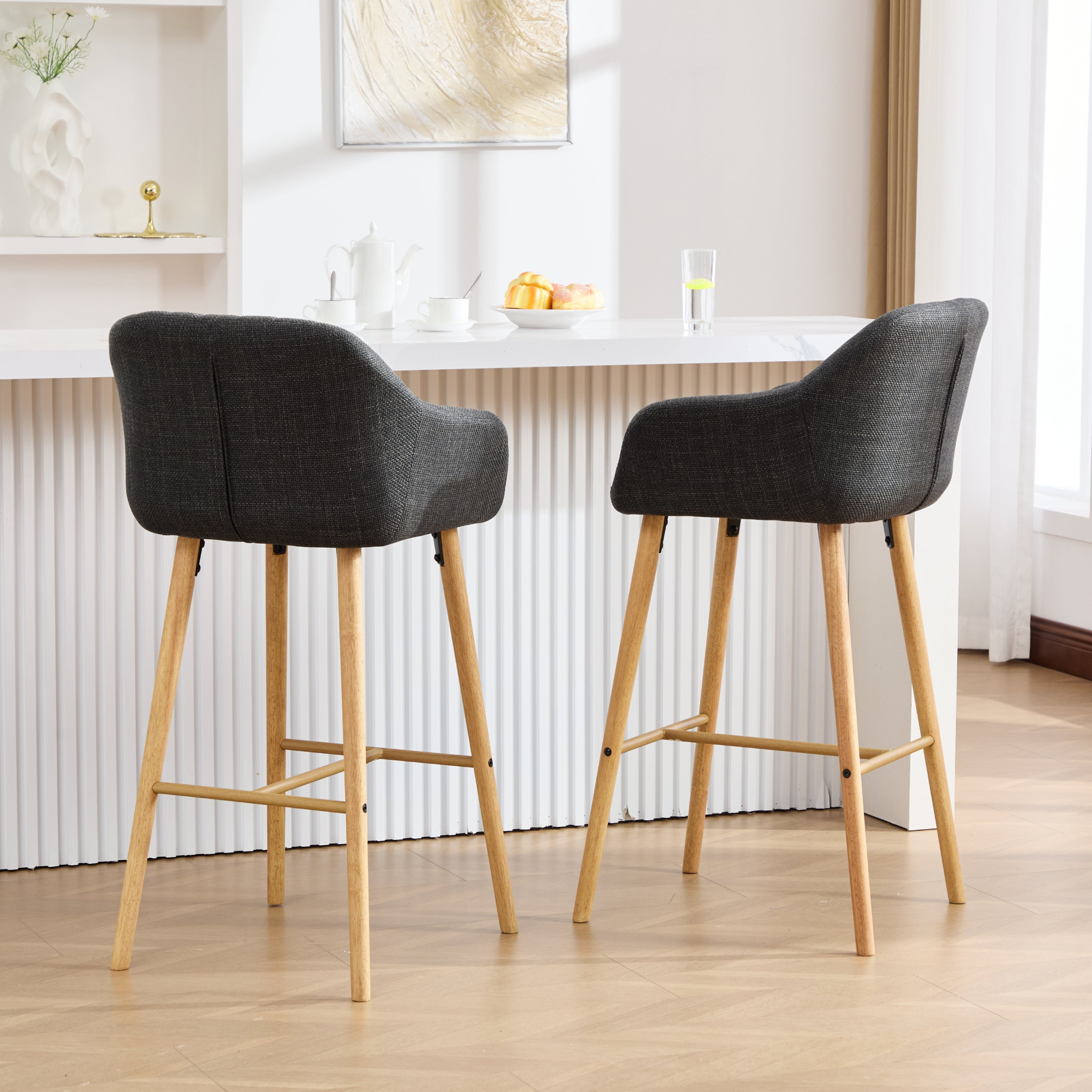 Modern linen upholstered bar stool with back, armrests, footrest, and solid wood legs by Start2Finish