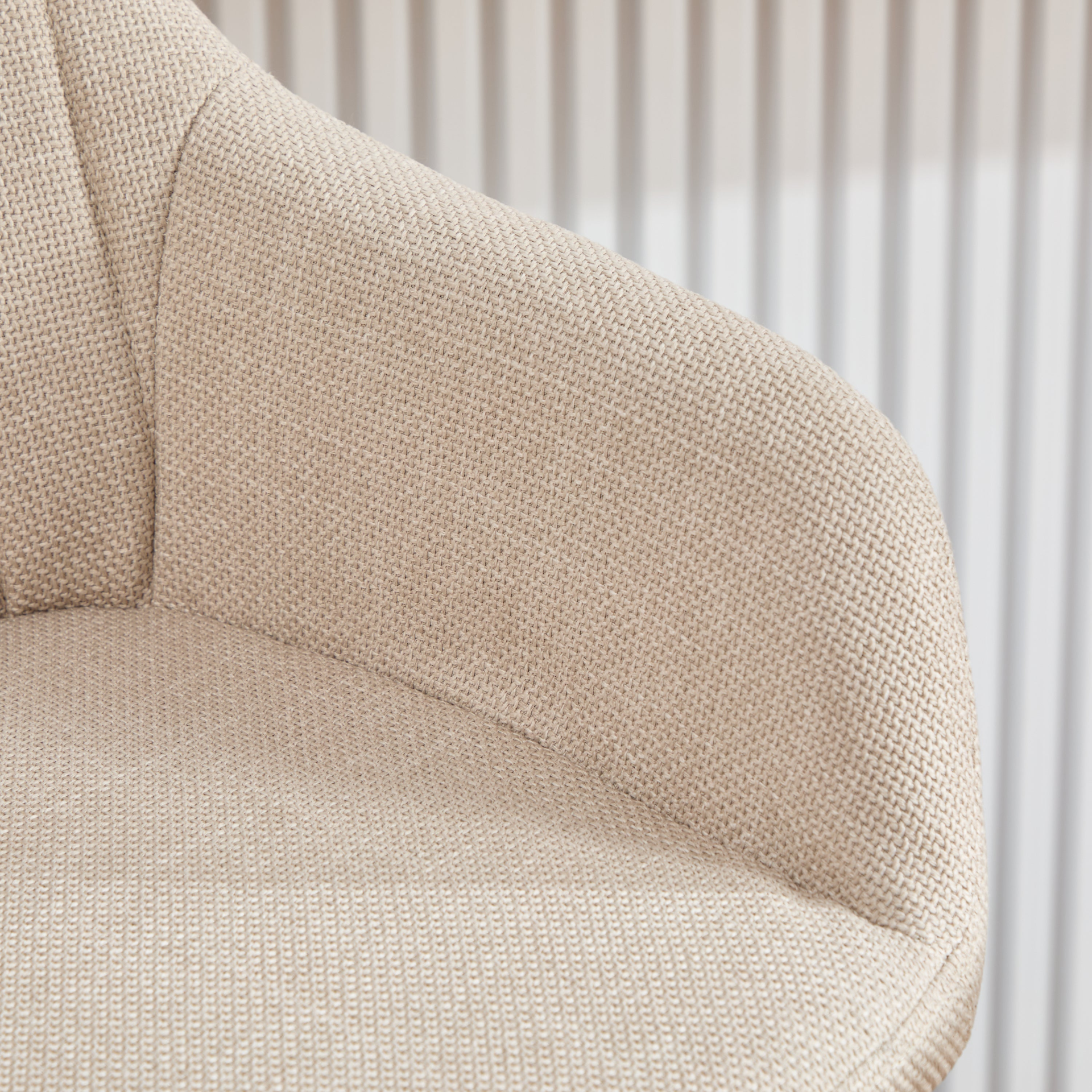 Modern linen upholstered bar stool with back, armrests, footrest, and solid wood legs by Start2Finish.