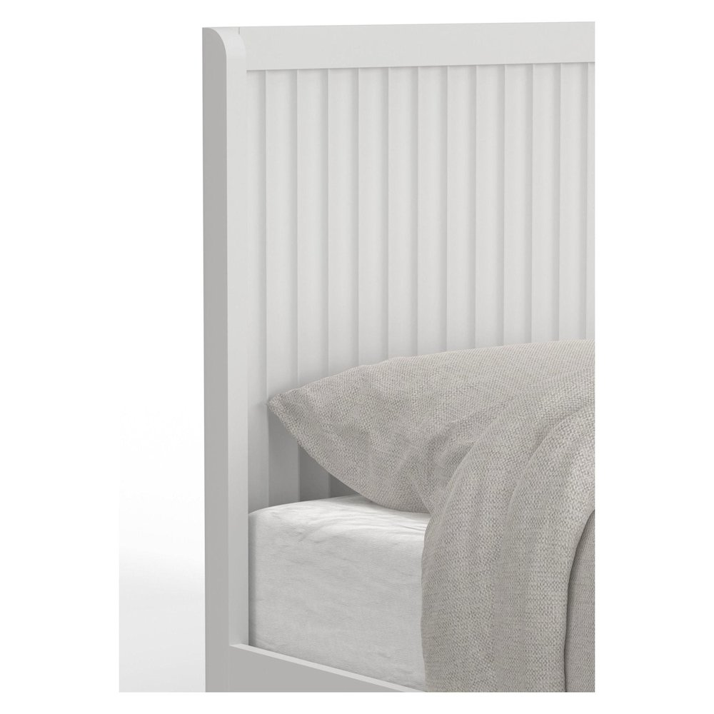 White Stapleton Queen Panel Bed by Start2Finish with a sleek headboard and classic design, shown in a well-lit bedroom setting.