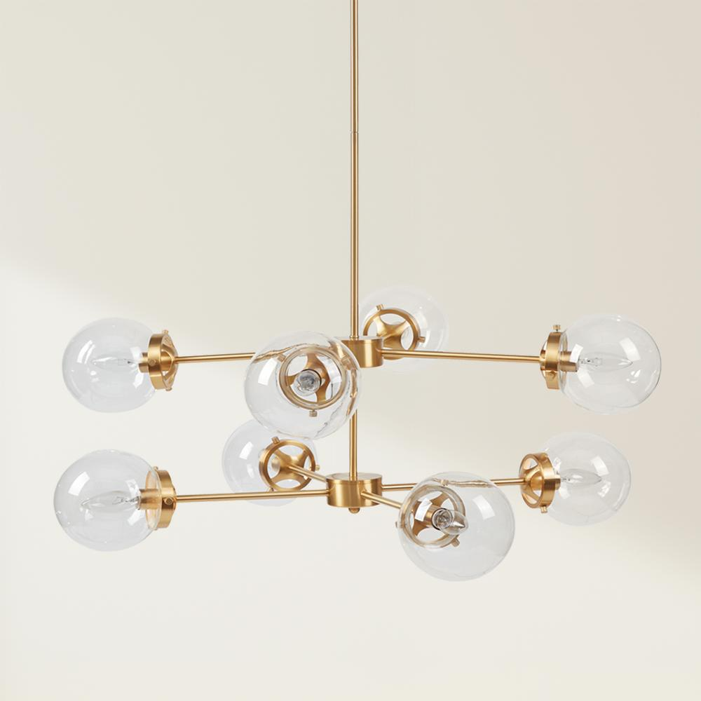 Start2Finish 8-light metal chandelier with globe bulbs hanging from a modern ceiling fixture in a stylish interior setting