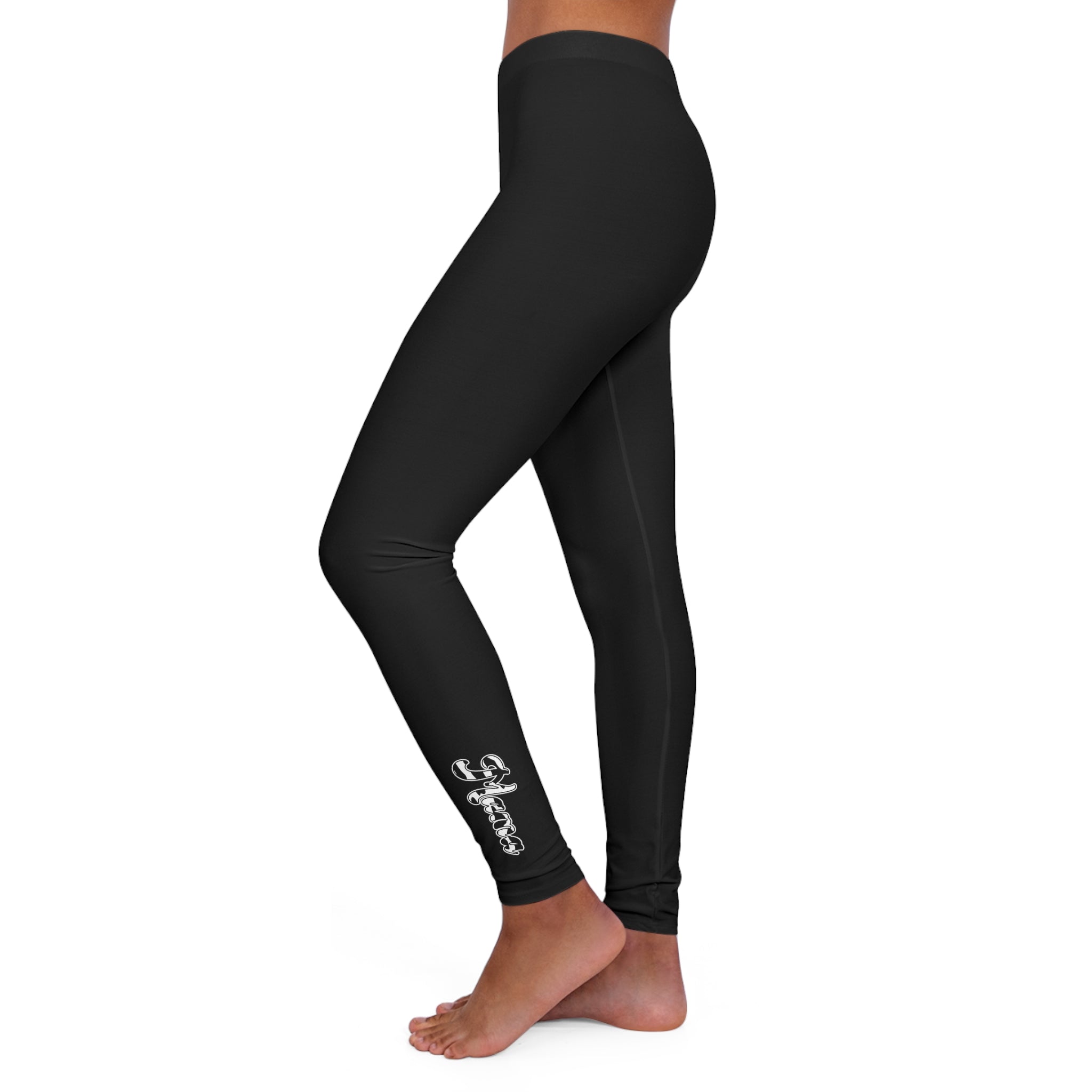 Women’s black fitness leggings with white abstract Mama pattern by Grey Coco, showcasing stretchy fabric and stylish design.