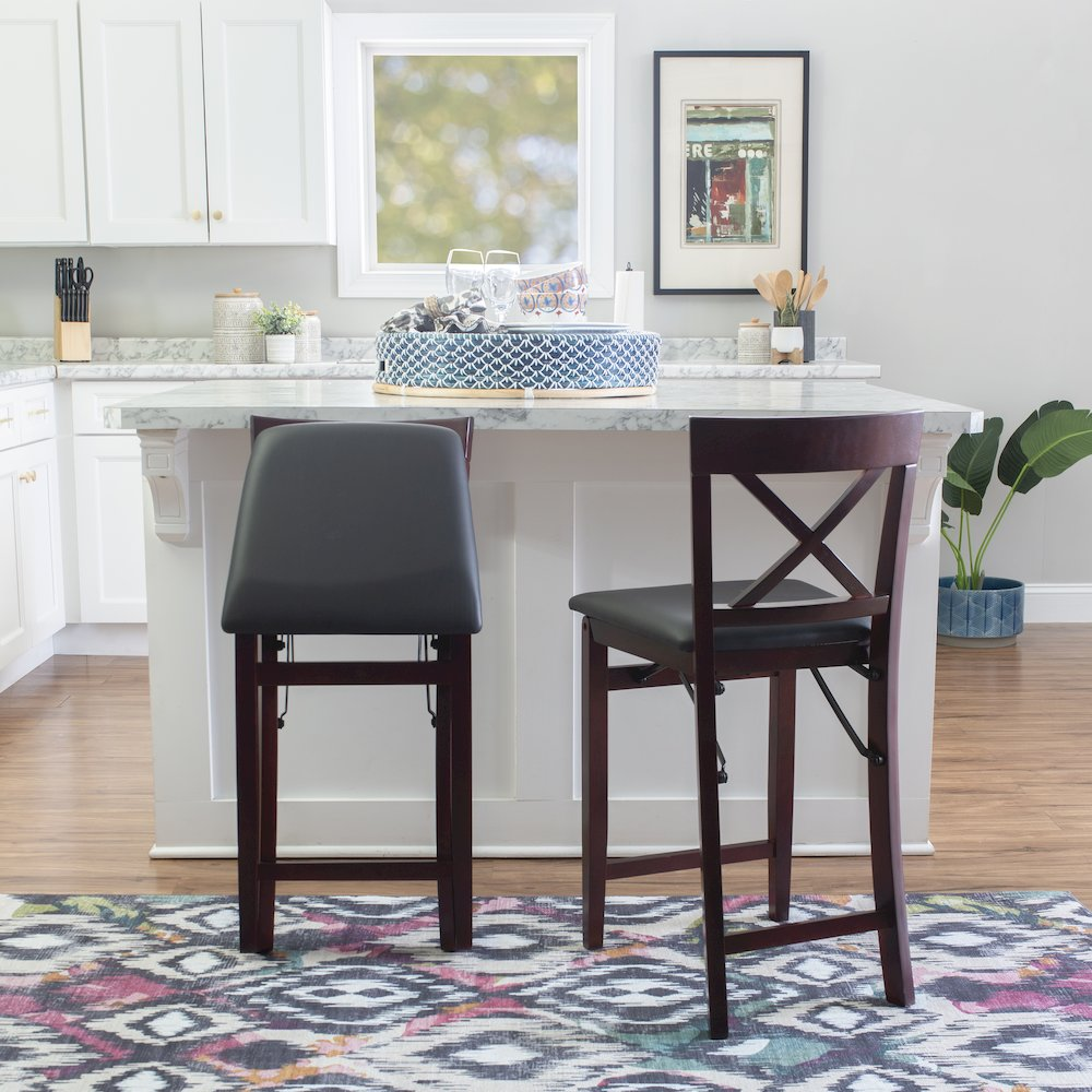 Start2Finish Triena 24-inch back folding counter stool with X-shaped backrest and wooden seat, suitable for kitchen or bar areas.