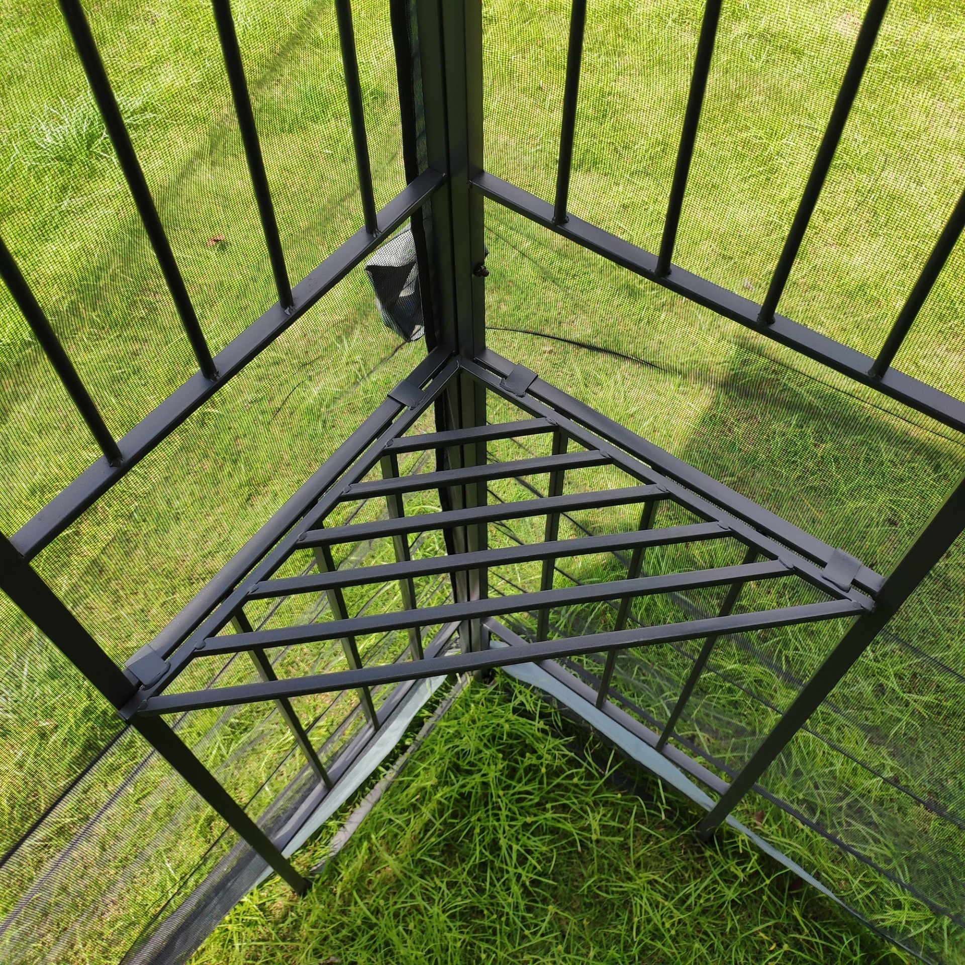 Gray metal outdoor gazebo canopy with roof and storage, ideal for patio and outdoor living spaces by Start2Finish.