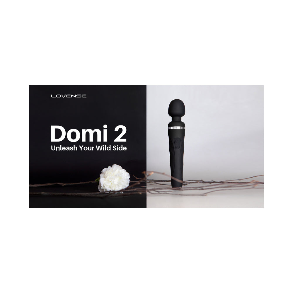 Lovense Domi 2 vibrating massage wand from Start2Finish, showing its sleek design and control buttons on a white background.