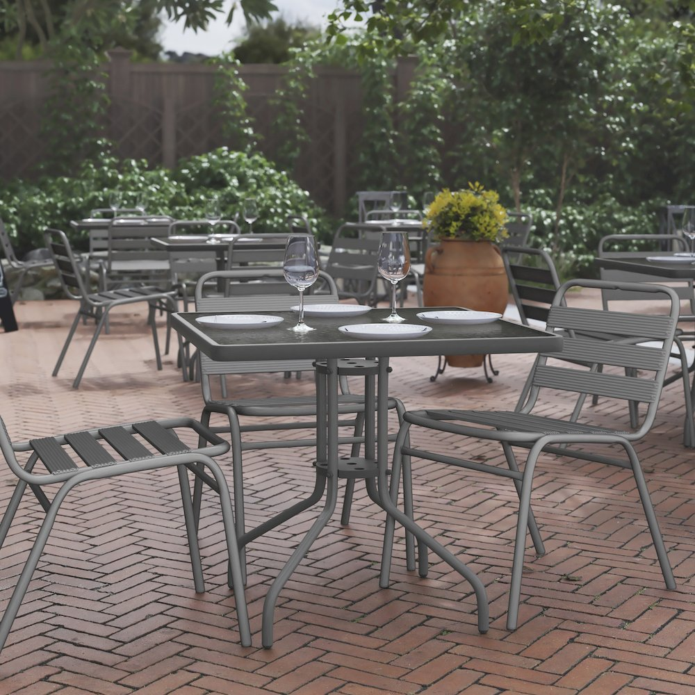 Square patio table for restaurants and banquet halls by Start2Finish, featuring a sturdy wooden top and metal legs for outdoor dining.