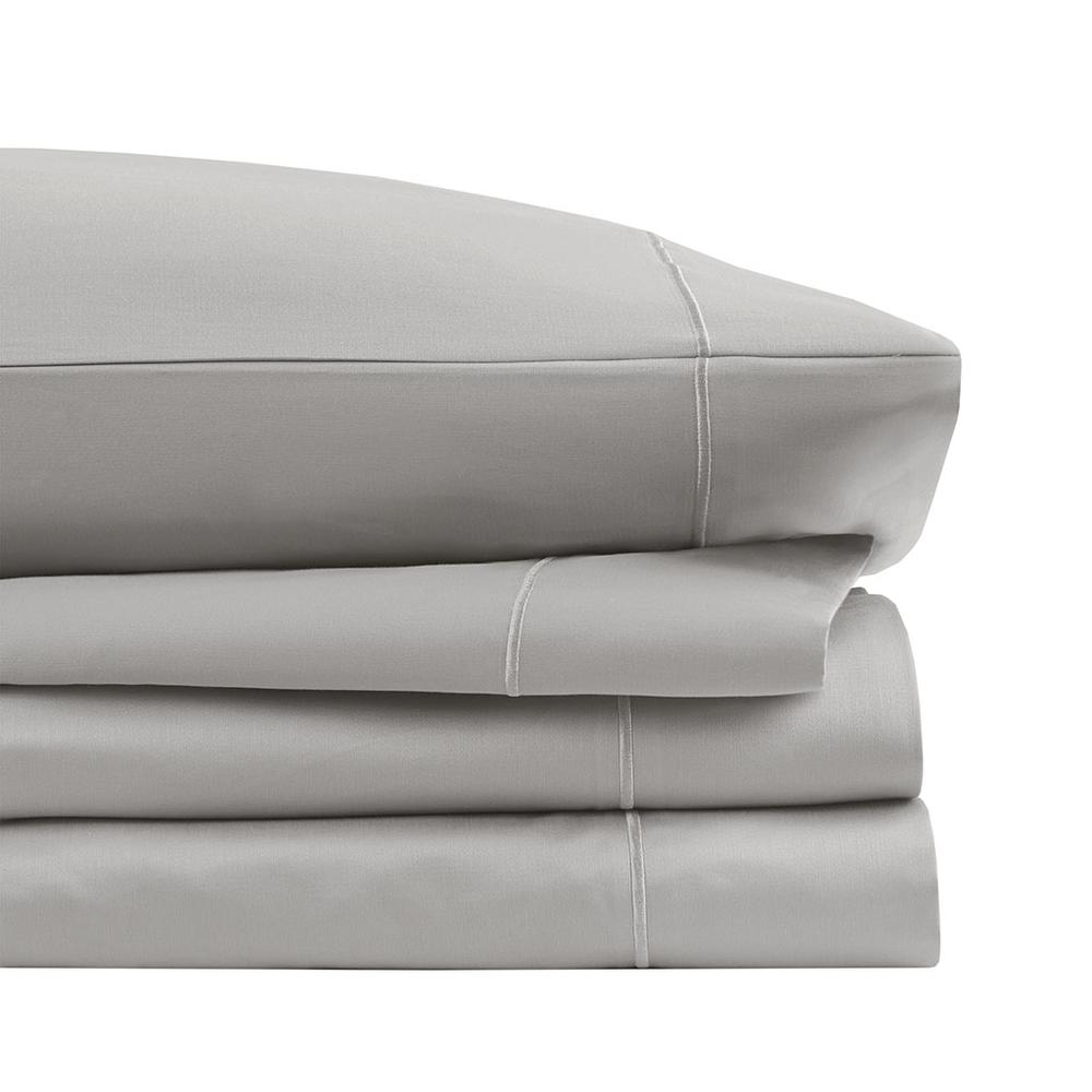 Start2Finish Pima Cotton Sheet Set with neatly folded white sheets and pillowcases on a bed, showcasing soft, high-quality fabric.