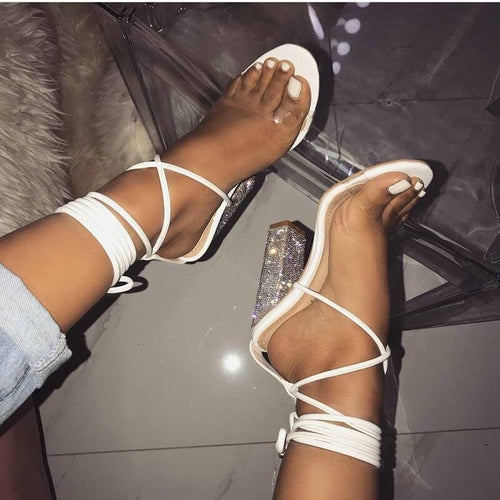 White transparent belt high-heeled sandals with open toes and thick heels from Silver Juneberry, featuring a stylish open-toed design.