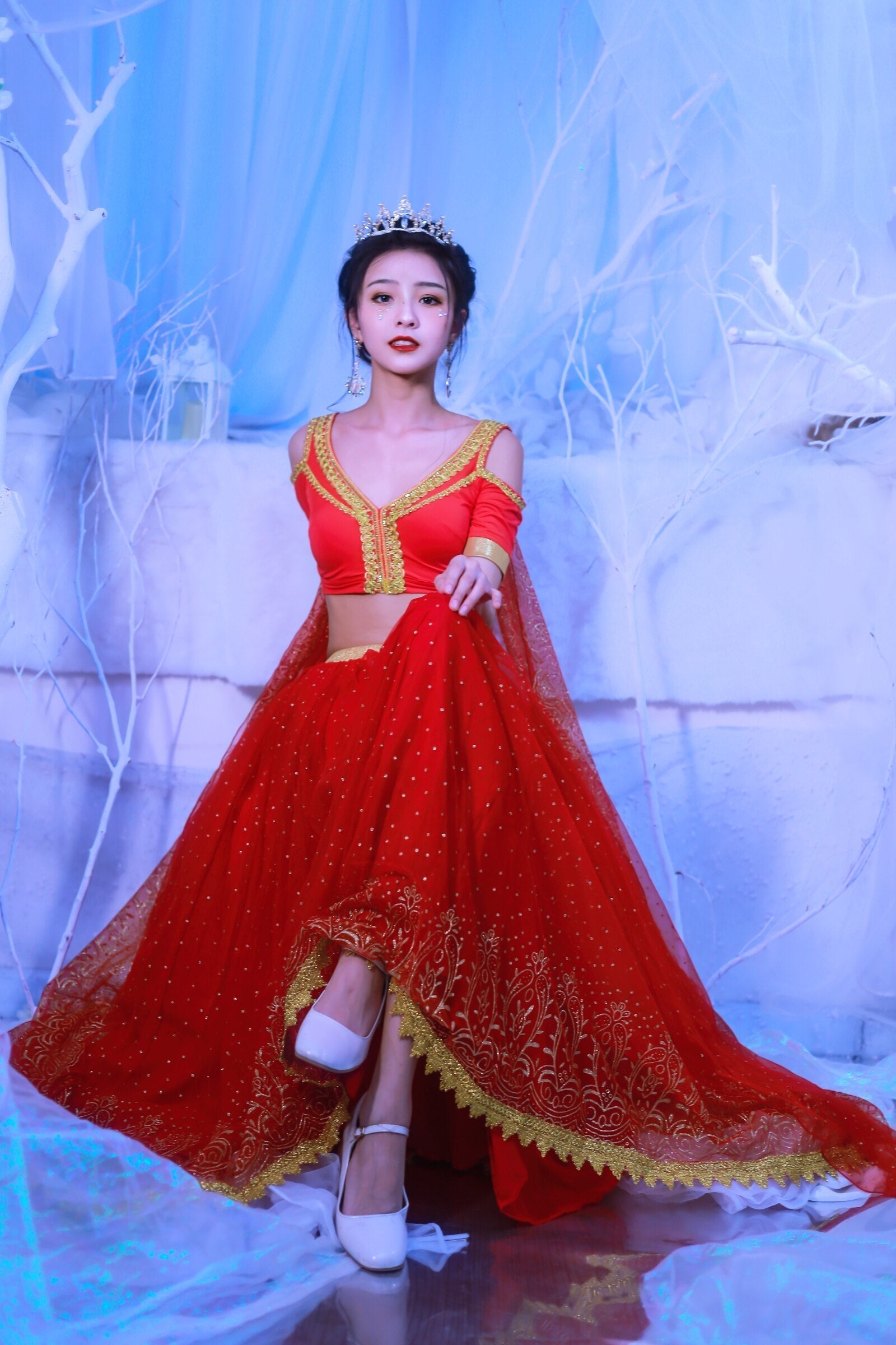 White Eucalyptus Elsa Princess costume for pets featuring a red belly dance-inspired outfit with detailed embellishments.