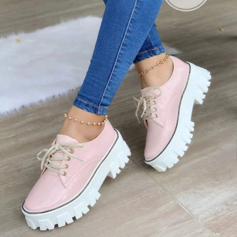 Pink, red, and black thick-heel flat platform Oxford shoes for women by Coffee Jasper, featuring a stylish and comfortable footwear design.