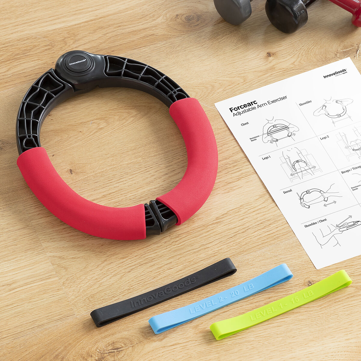 Adjustable arm exerciser with resistance bands and exercise guide from Bigbuy, designed for strength training and muscle toning.