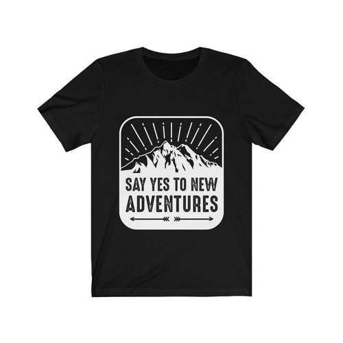 Plum Charlie Say Yes to New Adventures T-shirt featuring a motivational quote in casual style, worn by a person.