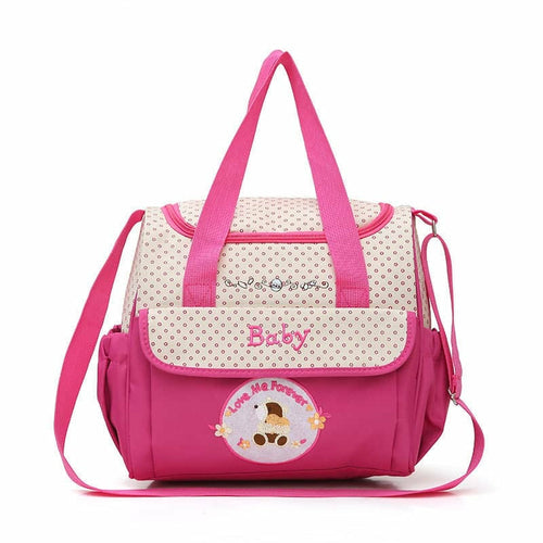 Mauve Thalassa diaper bag with personalized options, stylish and functional for parents, featuring spacious compartments and adjustable straps.