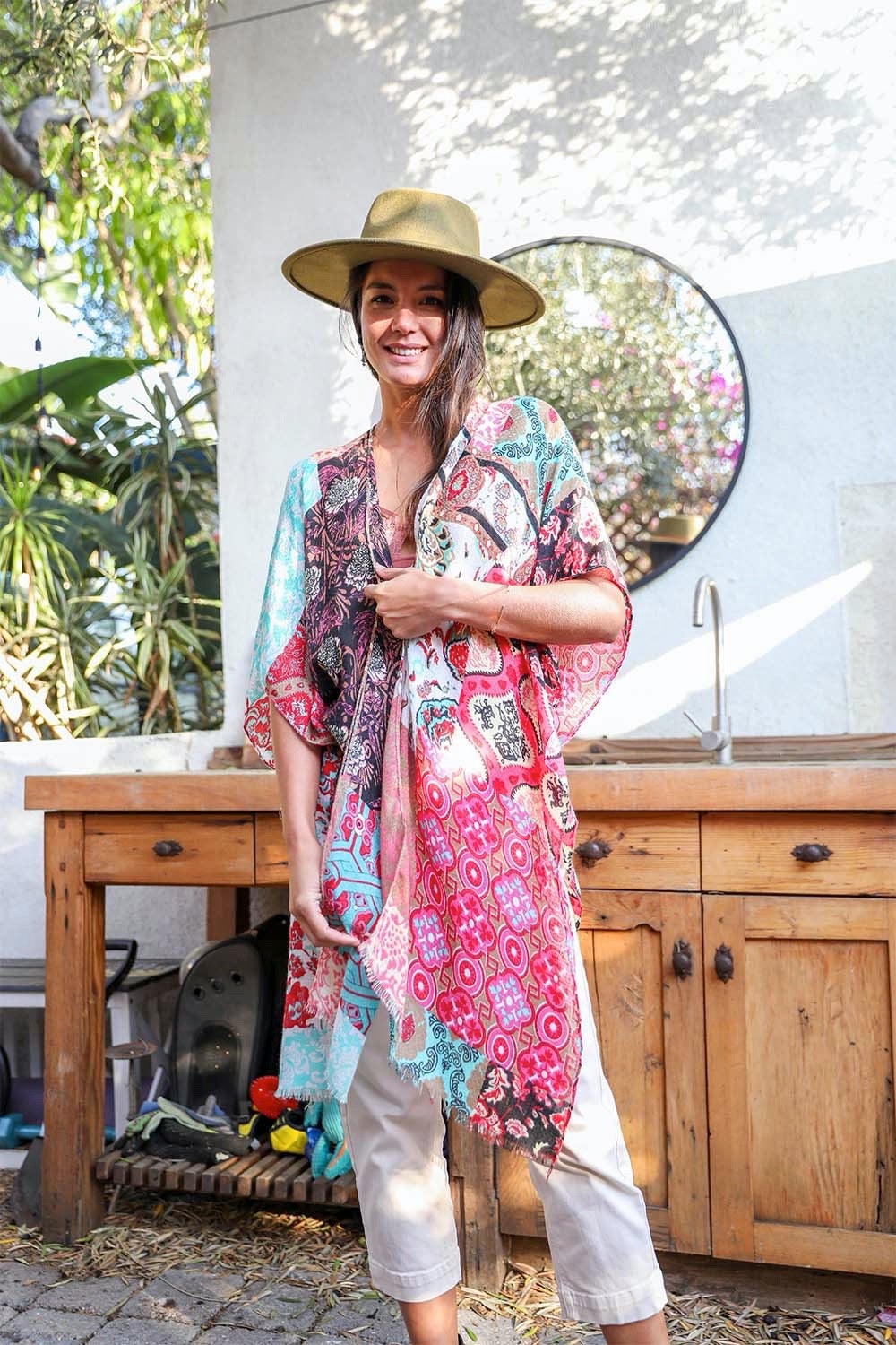 Mint boho patchwork kimono from Periwinkle Aether, featuring colorful patchwork patterns and flowy, lightweight accessory design.