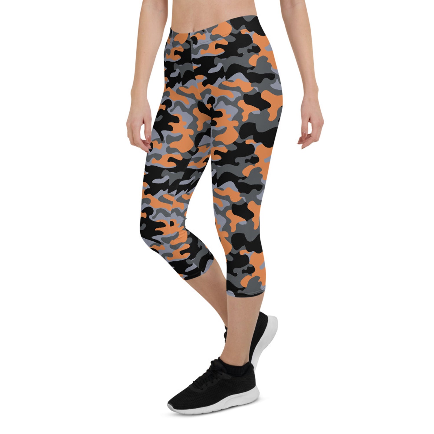 Orange and gray camo Capri leggings for women, Maroon Sooty activewear, showing the patterned stretch fabric and comfortable fit.