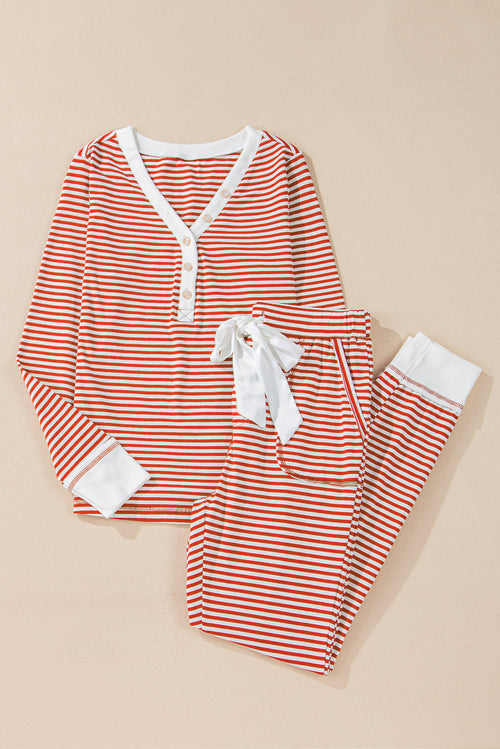Byzantium Bay Christmas stripe lounge set with matching top and pants, festive red and green holiday-themed sleepwear.