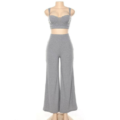 White two-piece women’s knitted tracksuit with sleeveless strapless crop top and matching pants, ideal for casual wear.
