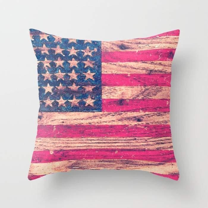 Vintage pink patriotic American flag pillow by Scorpius with retro wood design, perfect for textiles and home decor accents.