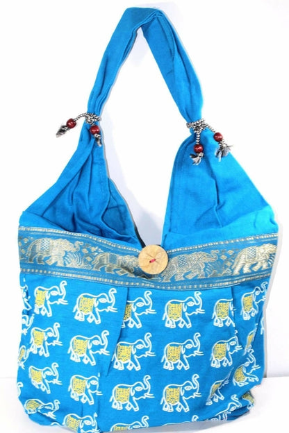 Silver Hestia elephant jhola tote bag with fabric handles and detailed elephant print, perfect for casual outings and beach days.