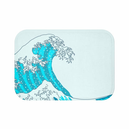 Yellow Pandora Waves bath mat with a wavy design, made of soft, absorbent material for bathroom comfort and safety.