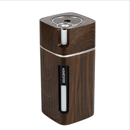 Maroon Asteria ultrasonic air humidifier USB mini mist maker with LED light, compact home improvement device for adding moisture indoors.