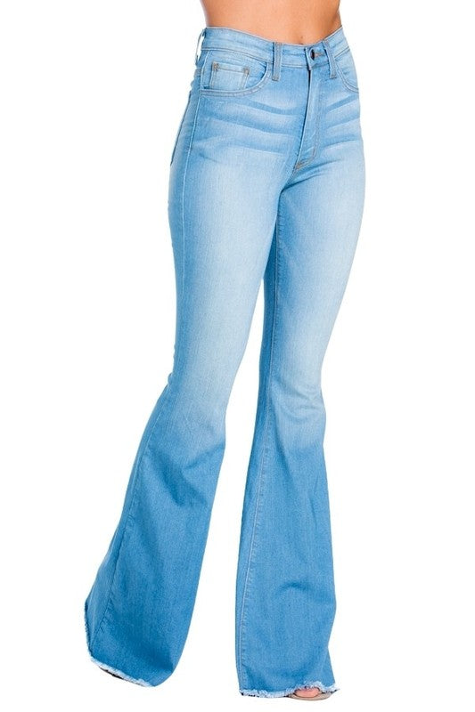 Light wash Jade Icarus Logan Bell Bottom Jean in automotive style, showing the distressed denim fabric and wide-leg design.