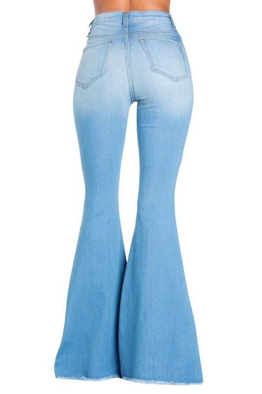 Light wash Jade Icarus Logan Bell Bottom Jean in automotive style, featuring a flared silhouette and classic denim details.