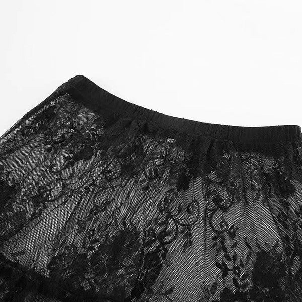 Floral lace ruffled maxi skirt from Jade Icarus, with intricate lace details and flowing ruffle design, perfect for elegant occasions.