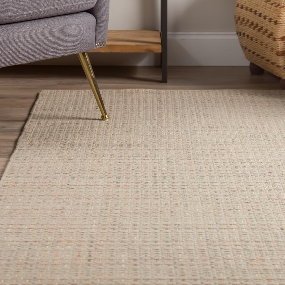 Taupe Nepal NL100 8x10 rug by Start2Finish featuring intricate patterns and soft texture on a neutral floor.