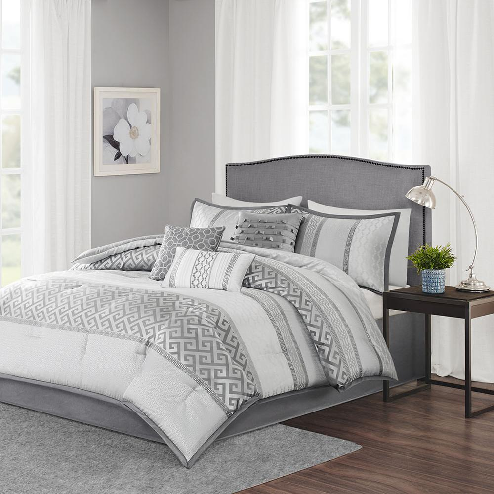 Start2Finish Bennett 7-piece grey comforter set with matching pillow shams and decorative pillows on a bed.