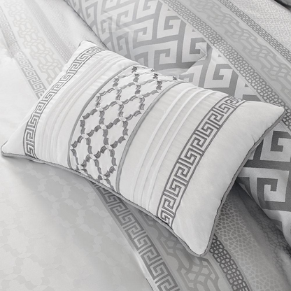 Start2Finish Bennett 7-piece grey comforter set with matching pillow shams and bedding accessories on a neatly made bed.