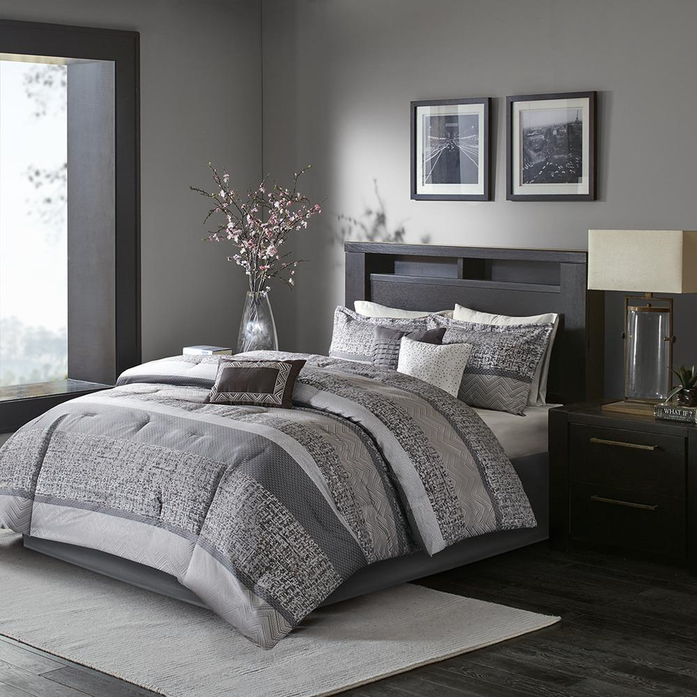 Start2Finish 7-piece Jacquard comforter set with decorative pillows and matching bed linens, showcasing intricate woven patterns.