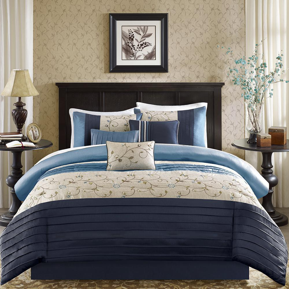 Serene embroidered navy 7-piece comforter set by Start2Finish, showing detailed floral embroidery on soft fabric with matching pillow shams.