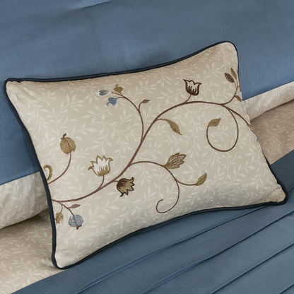 Start2Finish Serene Embroidered 7-Piece Navy Comforter Set with intricate stitching and matching pillow shams on a bed.