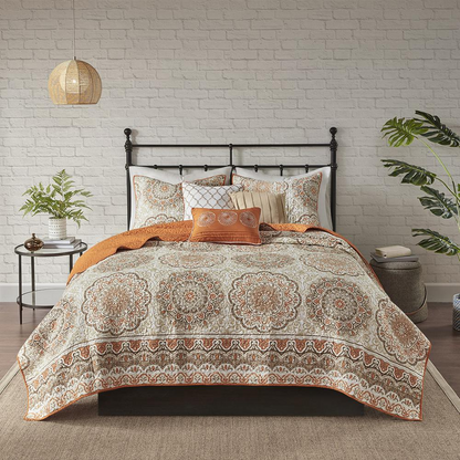 Start2Finish 6-piece reversible quilt set with matching throw pillows, showcasing colorful quilt patterns and cozy bedding.