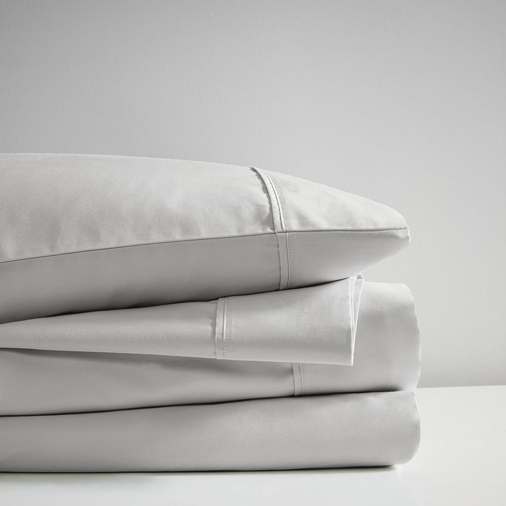 Start2Finish Pima Cotton Sheet Set with neatly folded white sheets and pillowcases, showcasing soft, high-quality bedding.