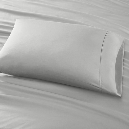 Start2Finish Pima Cotton Sheet Set with smooth, white bedsheets and pillowcases, showcasing soft, high-quality fabric on a neatly made bed.