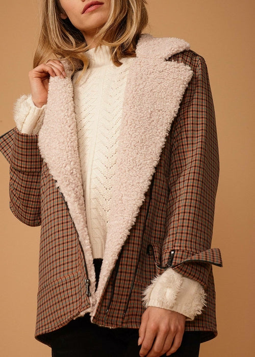 Lemon Hera asymmetrical zip front coat in peach gingham with a stylish collar and modern design, perfect for layered fall outfits.