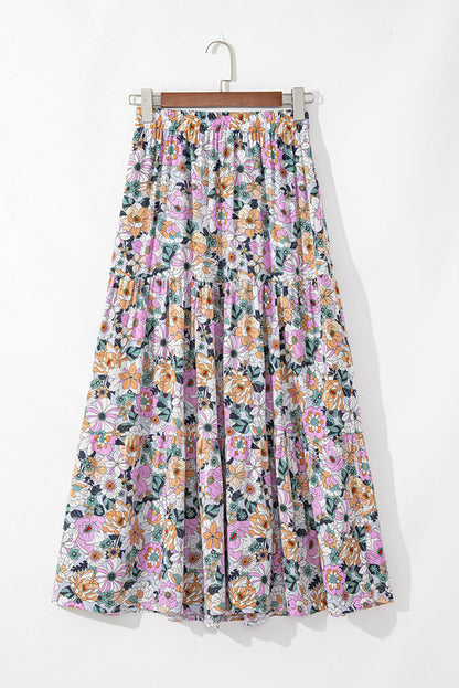 Byzantium Bay boho floral side slit tiered maxi skirt for women, flowing fabric with floral pattern and side slit detail.