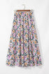 Byzantium Bay boho floral side slit tiered maxi skirt for women, flowing fabric with floral pattern and side slit detail.