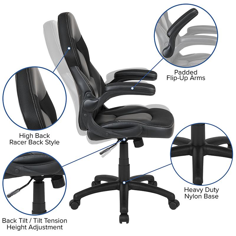 Black gaming desk with sleek surface and black racing chair from Start2Finish, ideal for gaming and workspace setups.