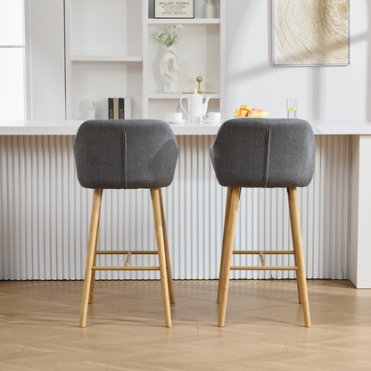 Modern linen upholstered bar stool with backrest, armrests, footrest, and solid wood legs from Start2Finish.