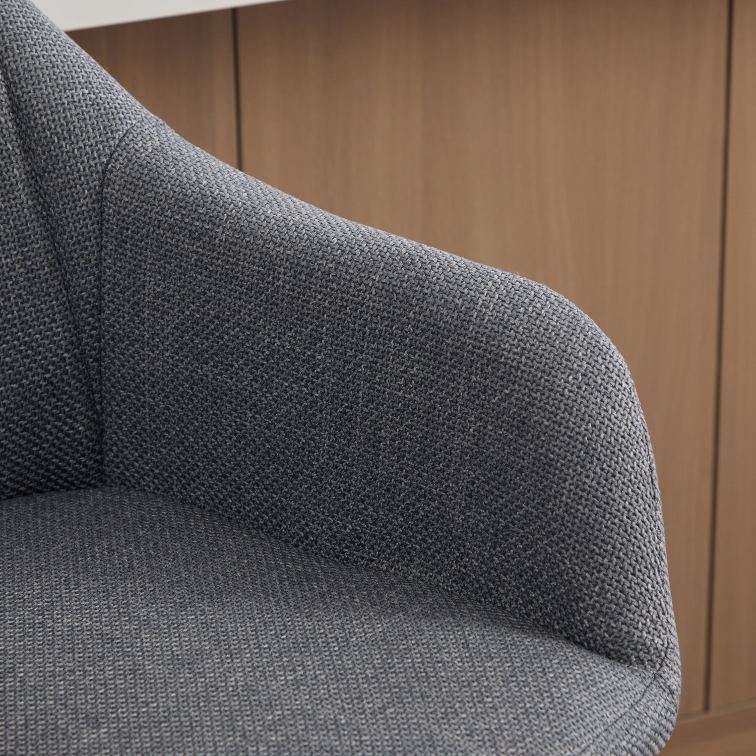 Modern linen upholstered bar stool with back, armrests, footrest, and solid wood legs by Start2Finish.