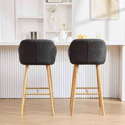 Modern linen upholstered bar stool with backrest, armrests, footrest, and solid wood legs from Start2Finish.