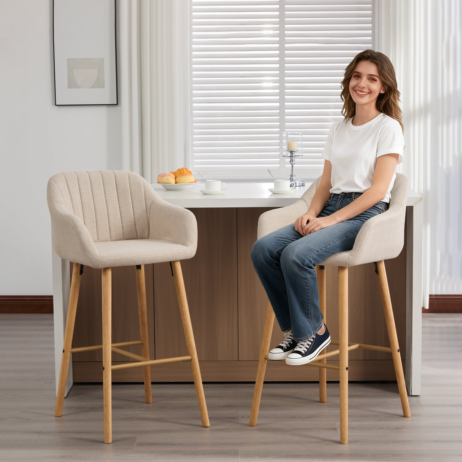 Modern linen upholstered bar stool with back, armrests, footrest, and solid wood legs from Start2Finish.