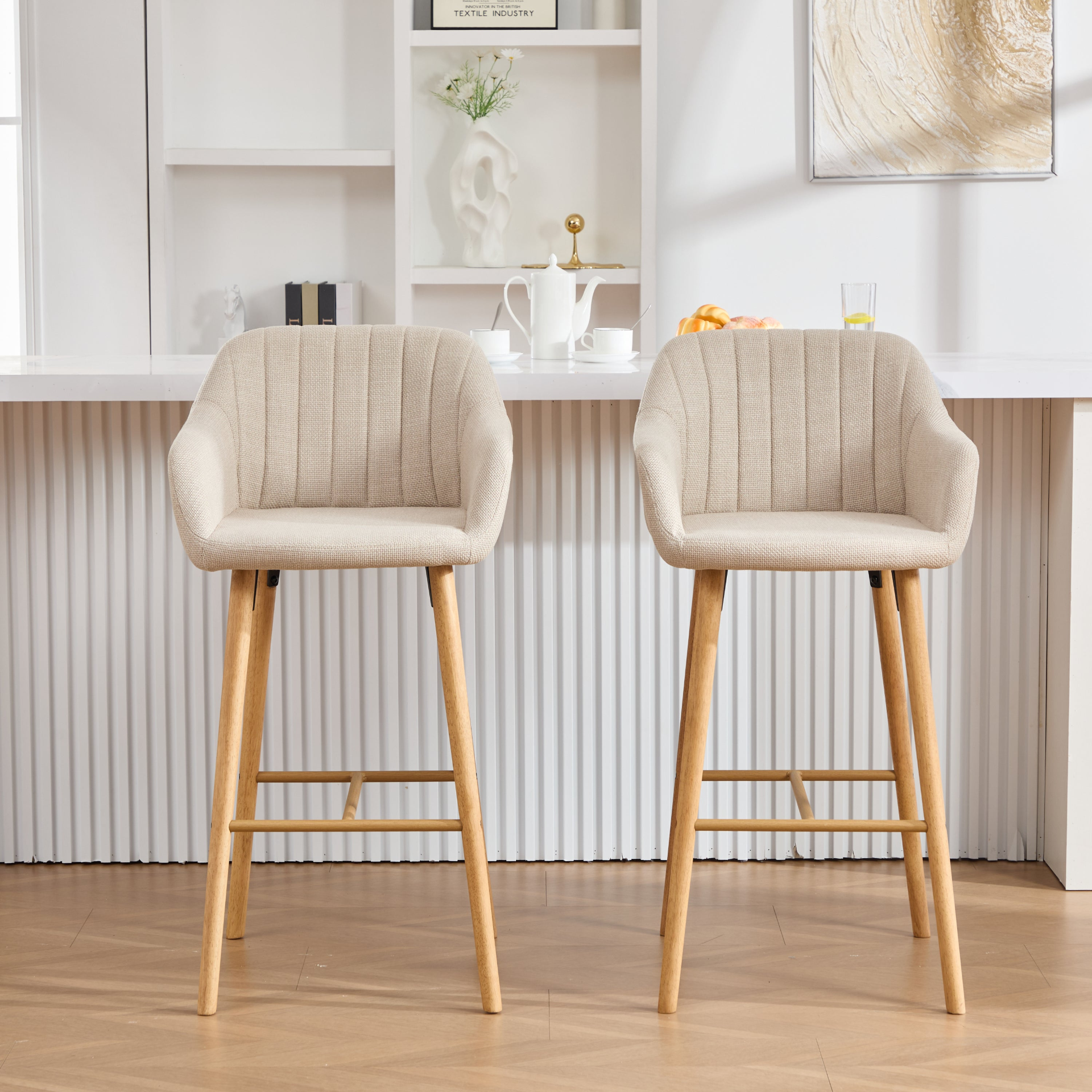 Modern linen upholstered bar stool with back, armrests, footrest, and solid wood legs by Start2Finish