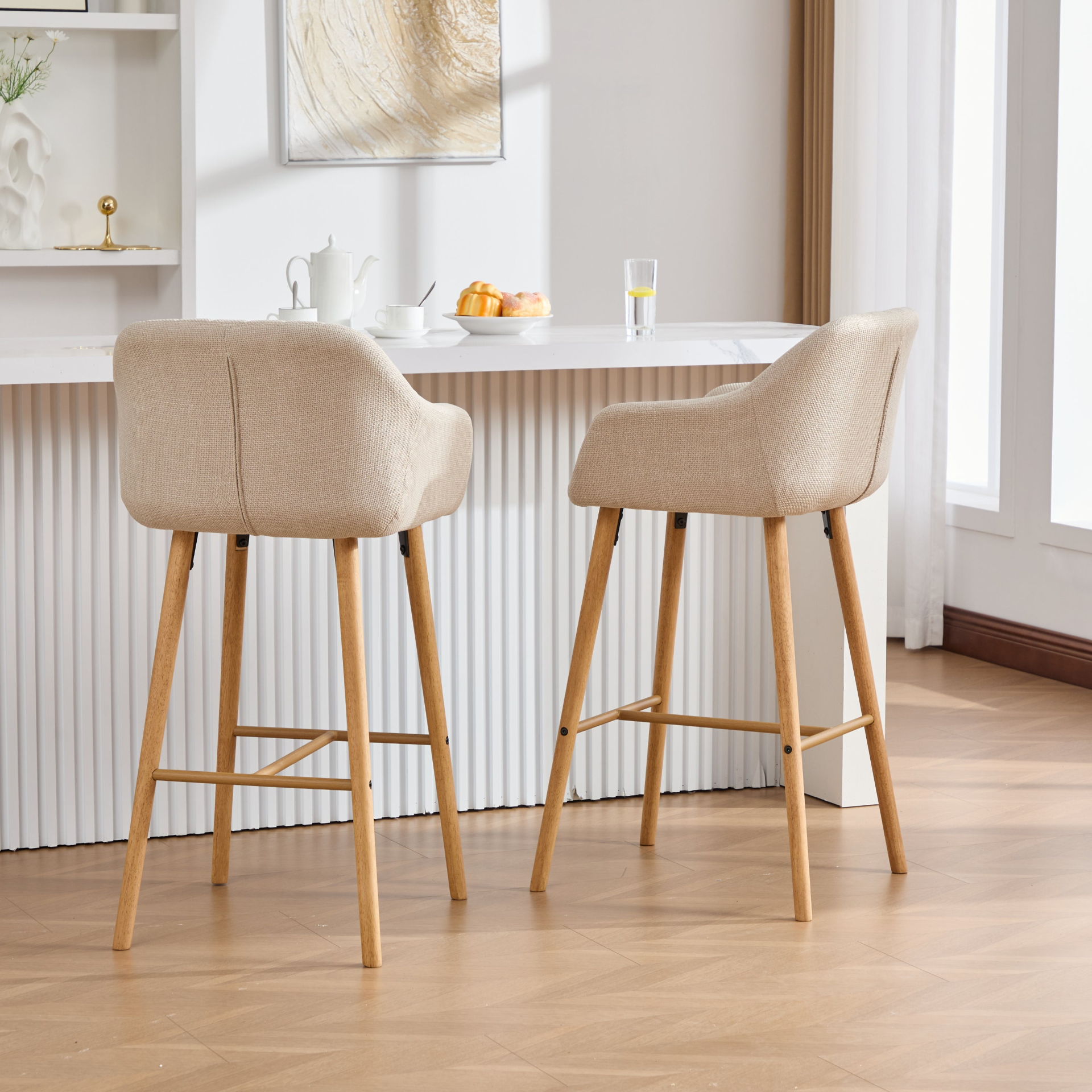 Modern linen upholstered bar stool with backrest, armrests, footrest, and solid wood legs by Start2Finish